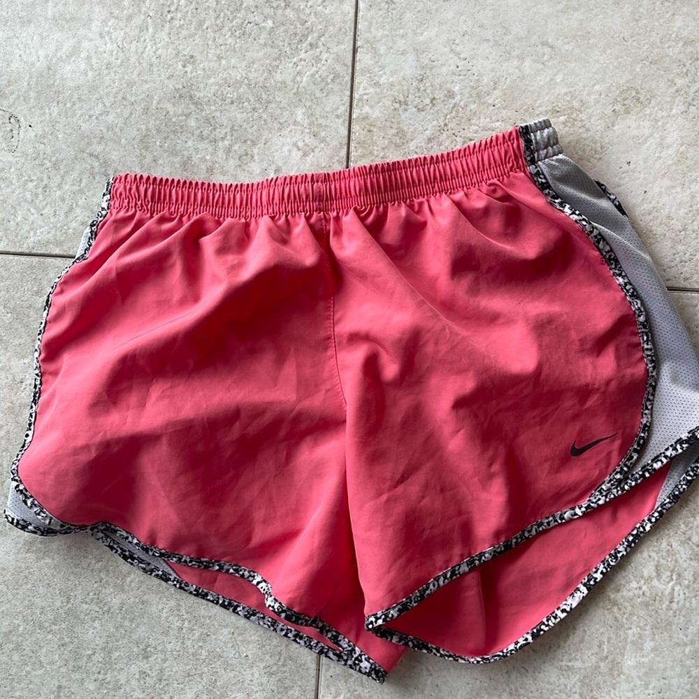 Girls Nike shirts. Never worn size large